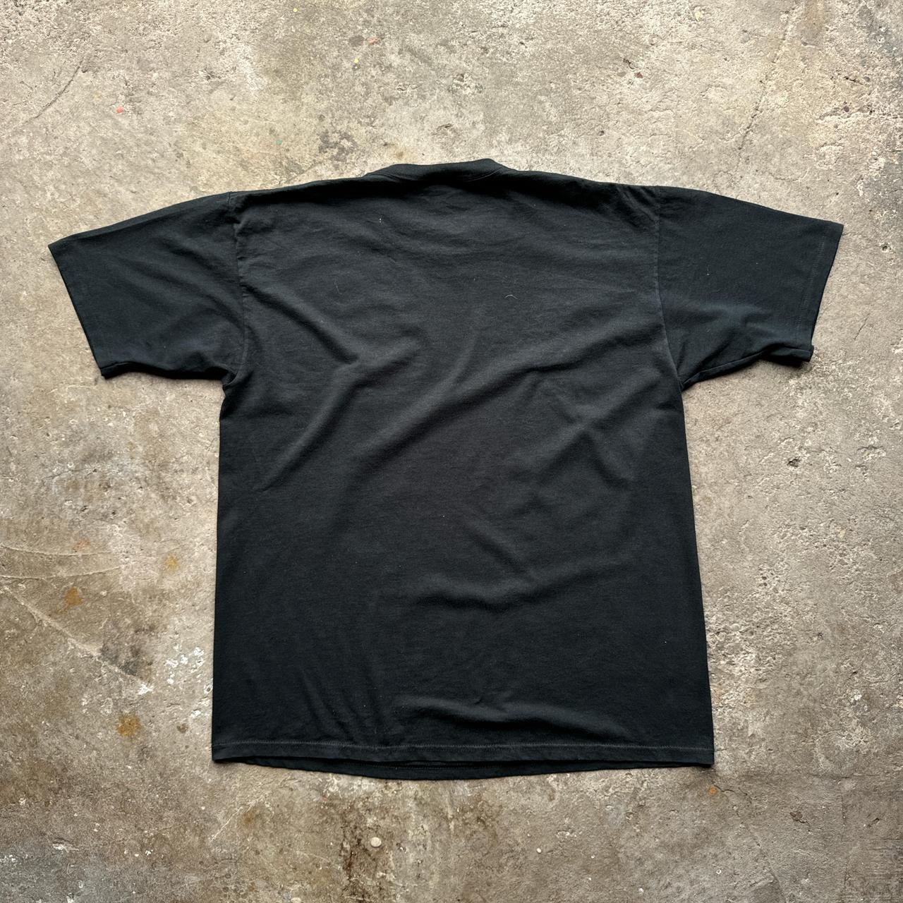 Black graphic tee with ‘mathematics are radical’ print