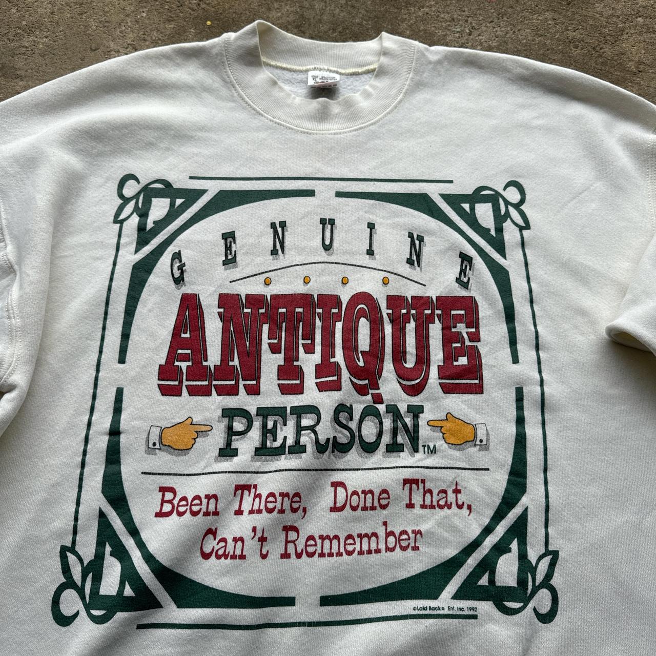 White 90s sweatshirt with ‘Antique’ print