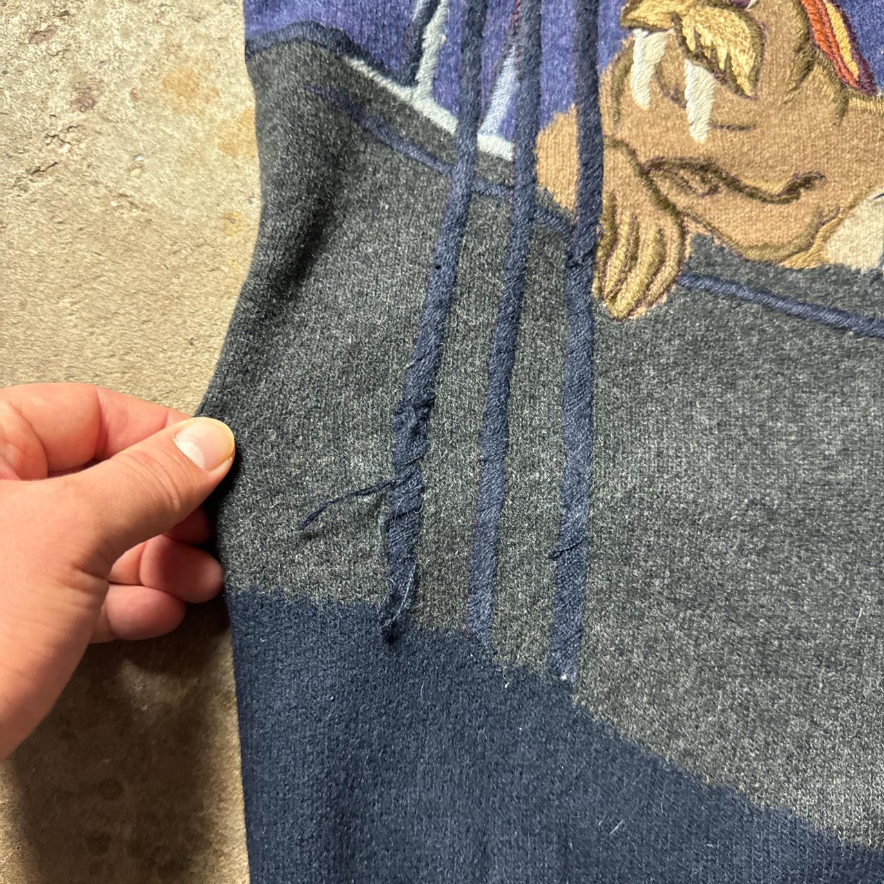 Navy blue vintage Iceberg cardigan with embroidered seal patch