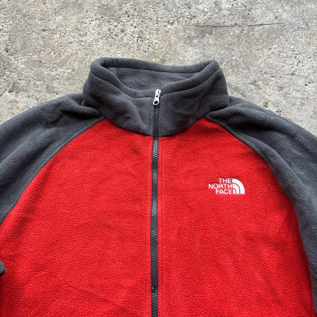 Red and grey The North Face zip-up fleece