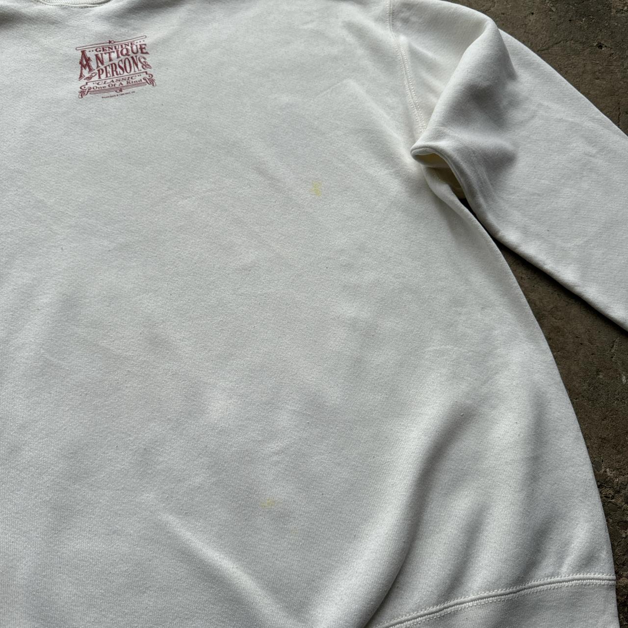 White 90s sweatshirt with ‘Antique’ print