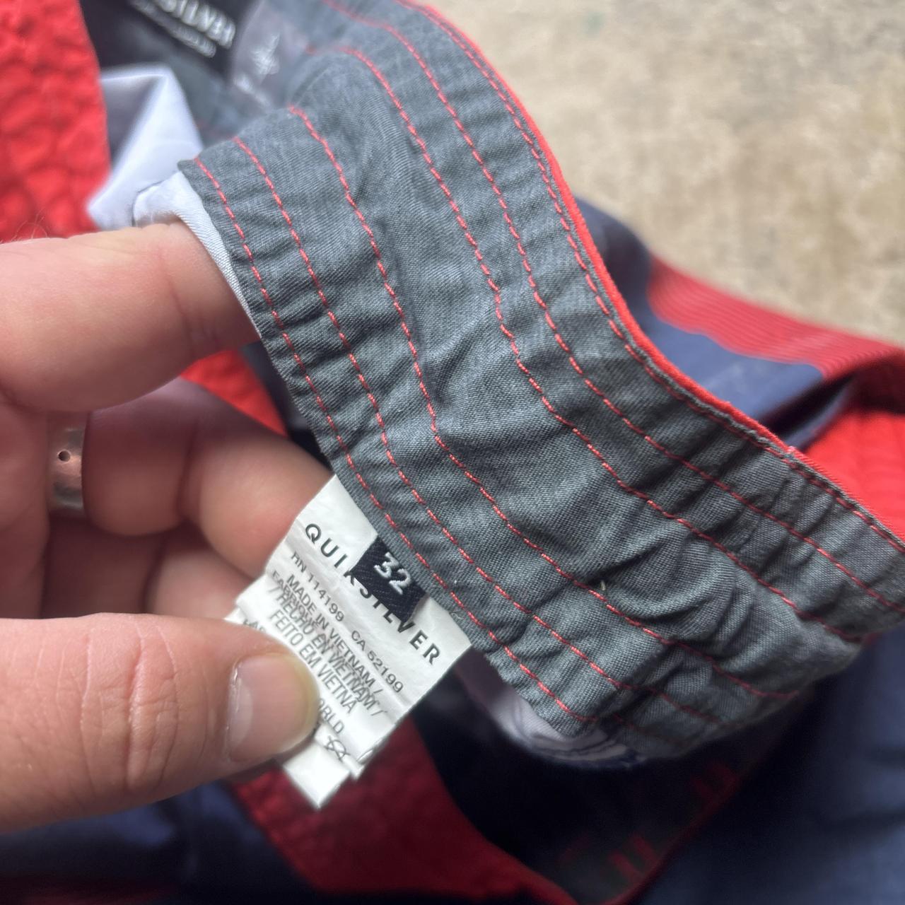 Red and navy Quiksilver board shorts - W32