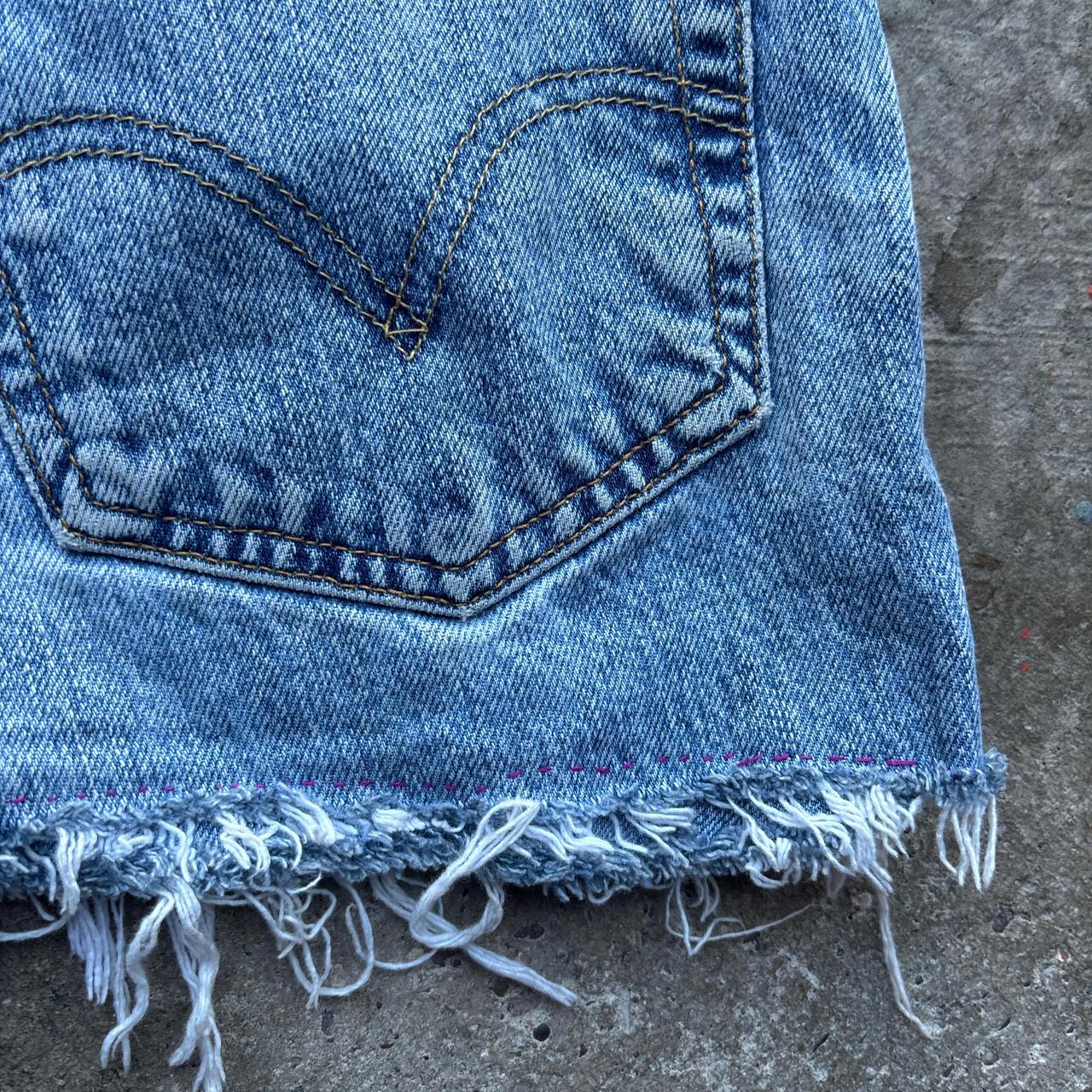 Blue denim Levi’s 505 cut shorts