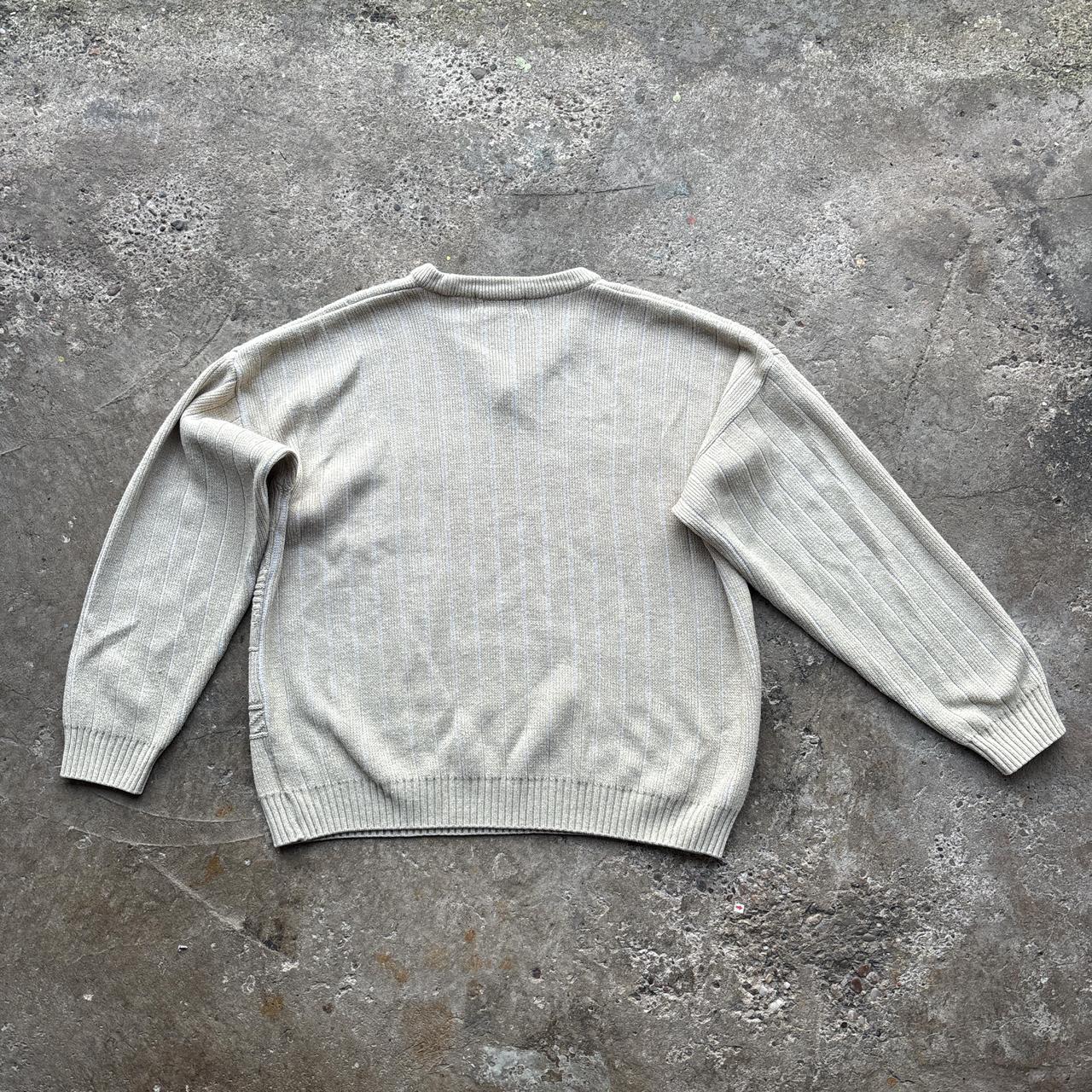 Cream striped / patterned knitted v-neck sweater