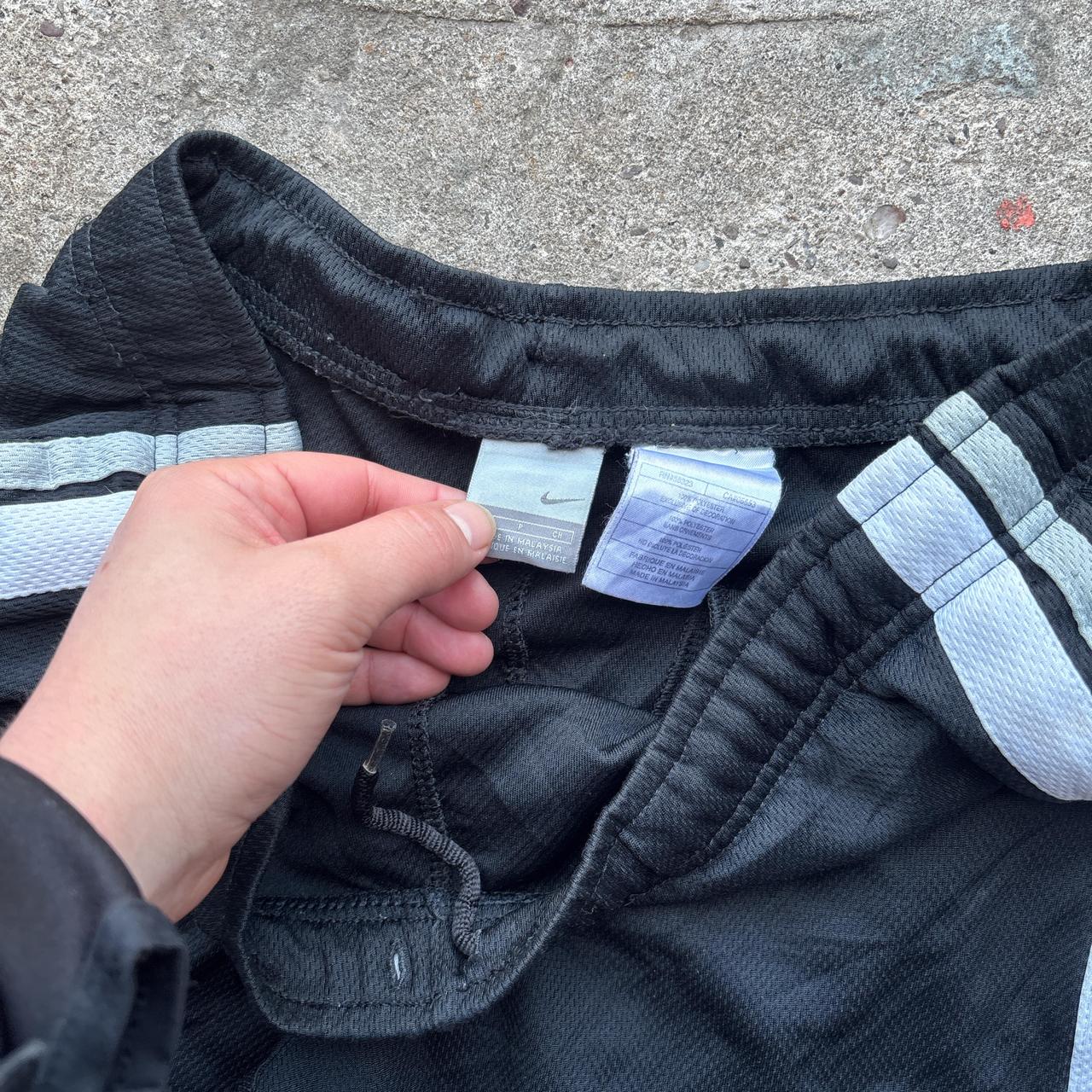Black and white 00s Nike track pants