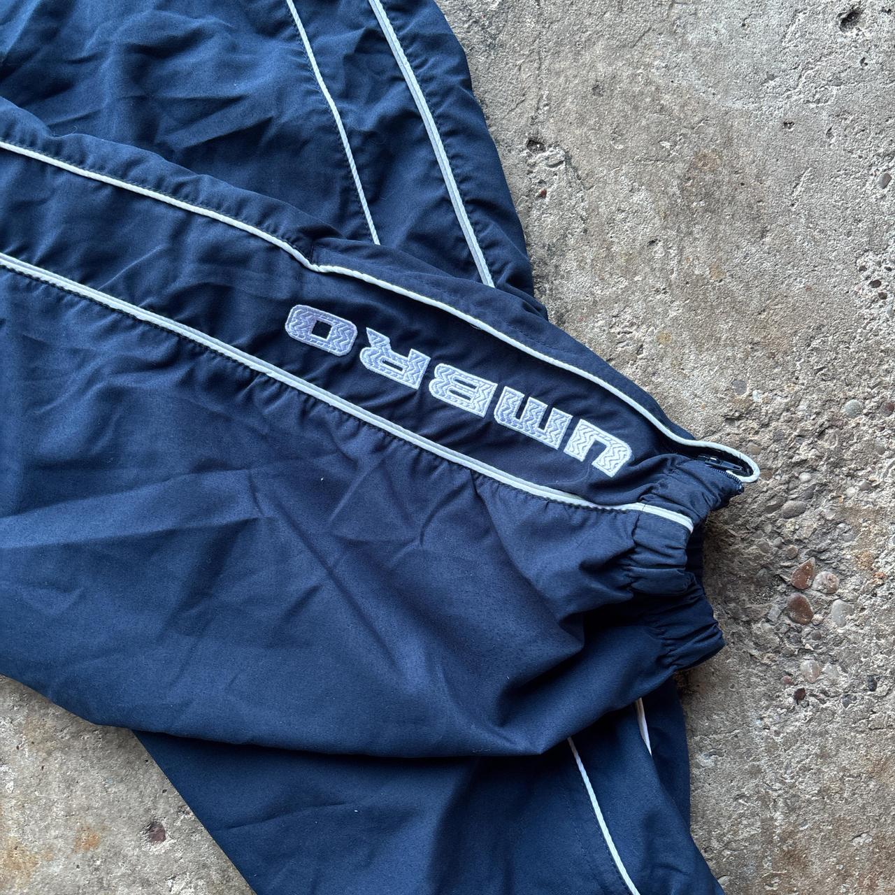 Navy Umbro joggers with white detailing