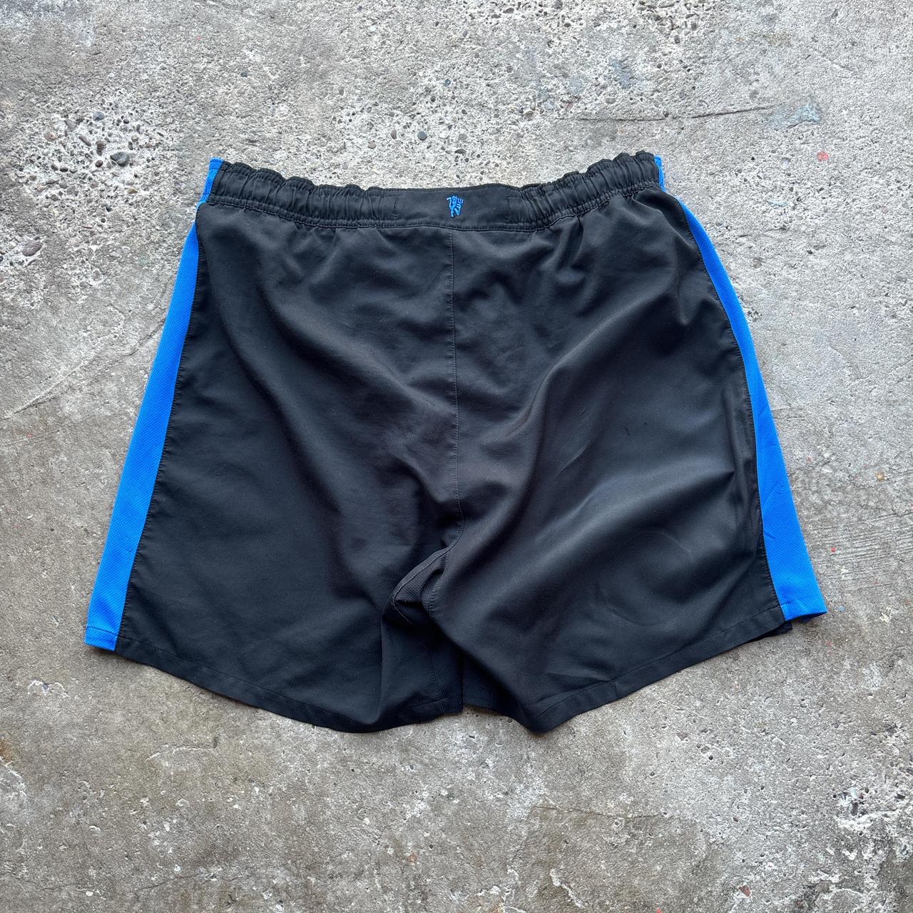 Black and blue Nike Football shorts - M