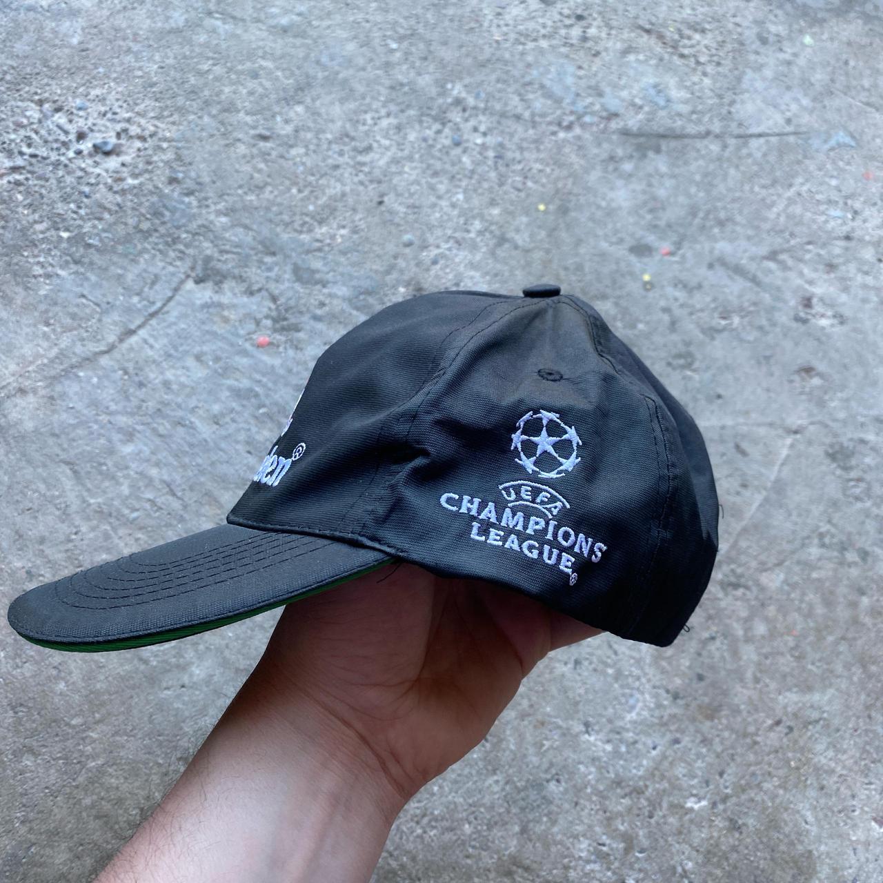 Black and green Heineken Champions League hat