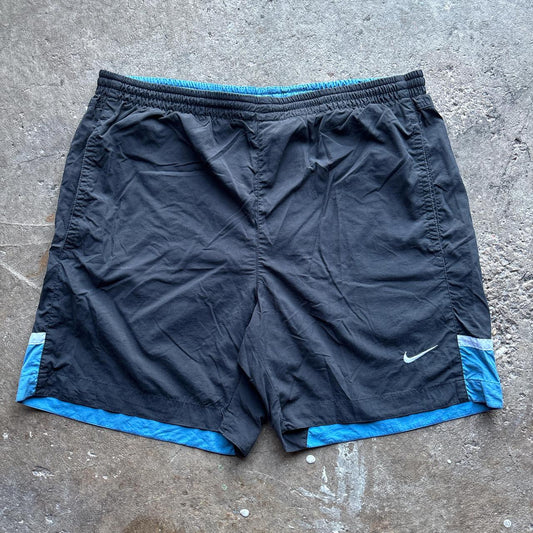 Black and blue Nike shorts / trunks