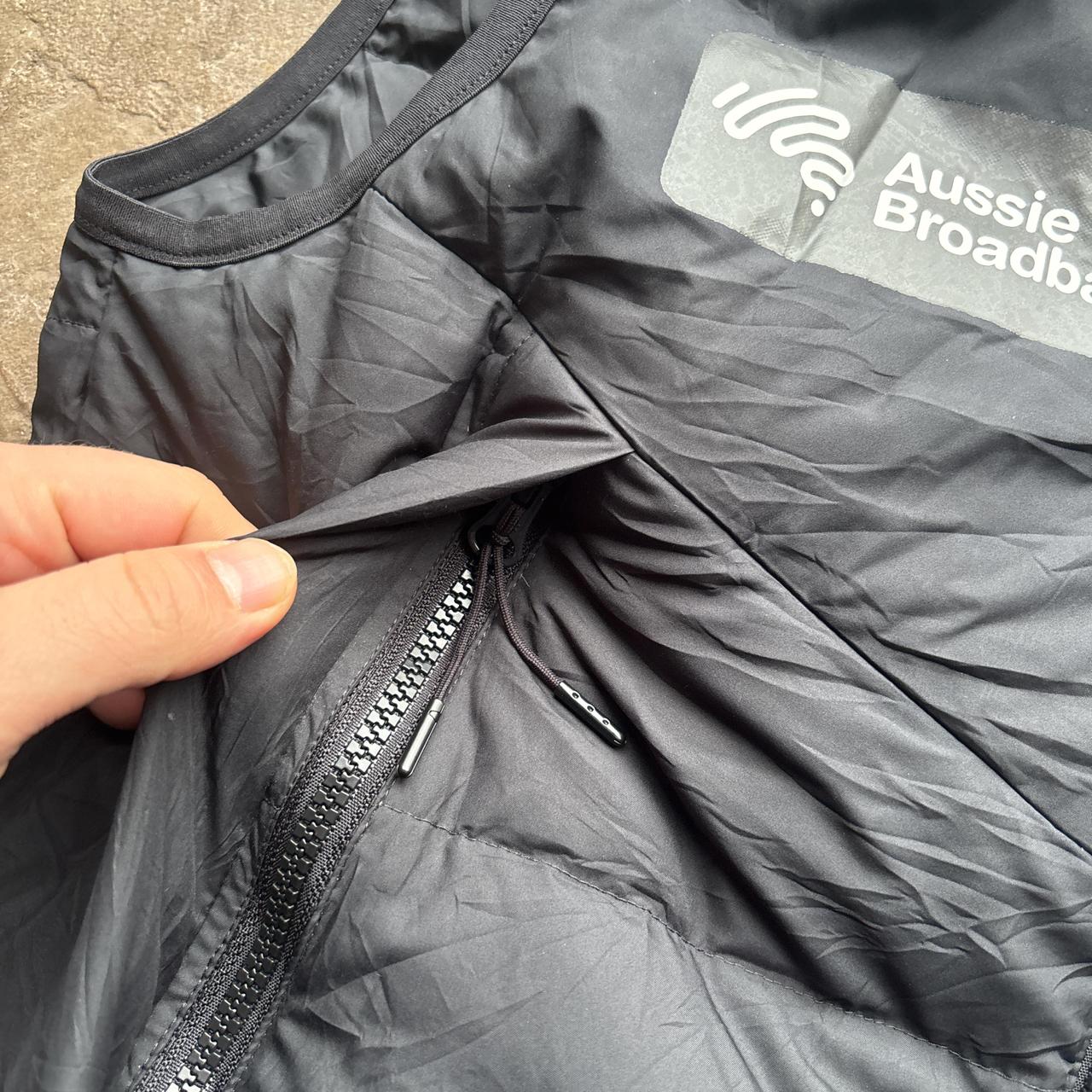 Black Nike puffer gilet with Melbourne Stars logo