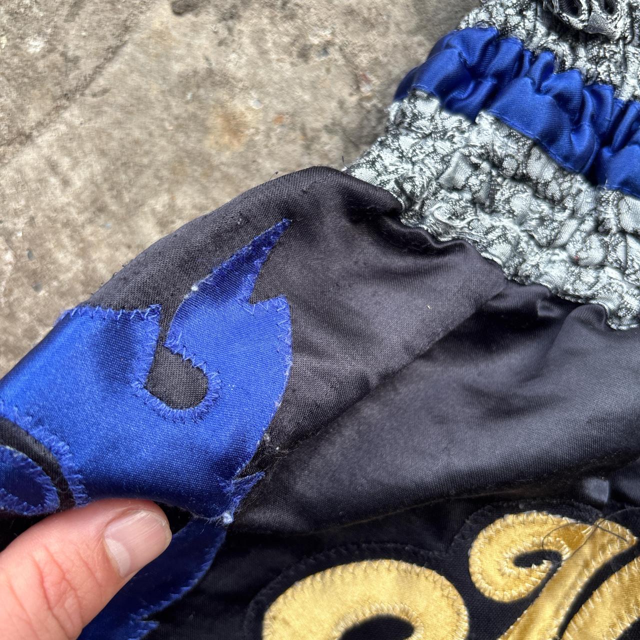 Black and blue Muay Thai shorts