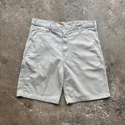 Cream Carhartt shorts