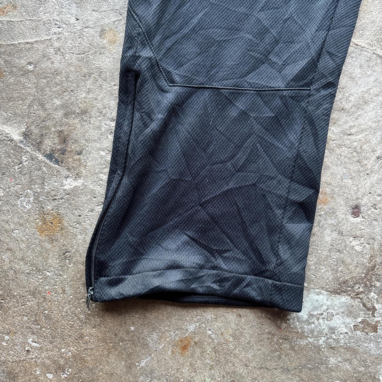 Black and white 00s Nike track pants