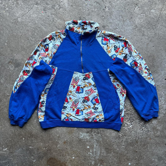 Blue and patterned half-zip sweatshirt
