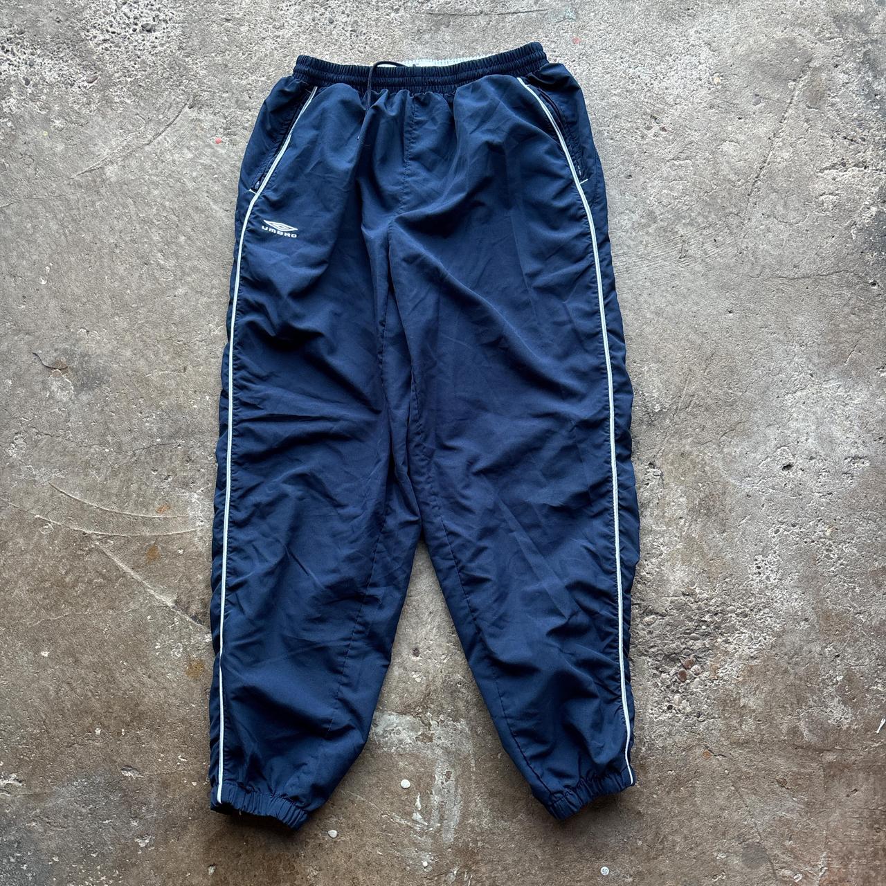 Navy Umbro joggers with white detailing