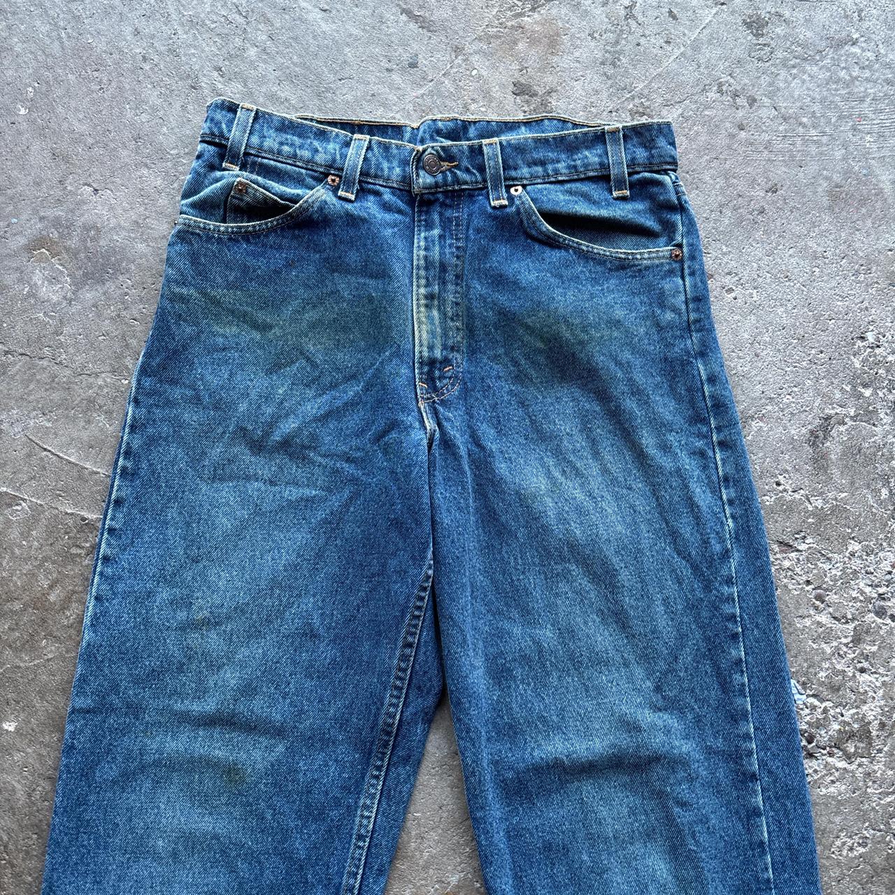 Levis 550 blue denim jeans with orange label