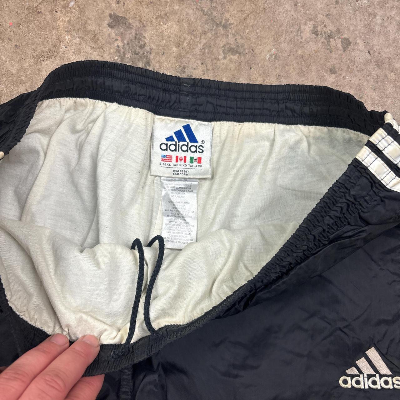 90s Adidas black track pants with white stripes