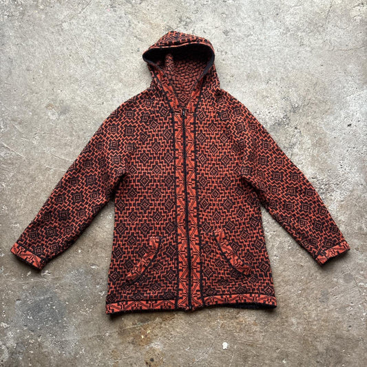 Hand knit orange and black tapestry hooded wool jacket