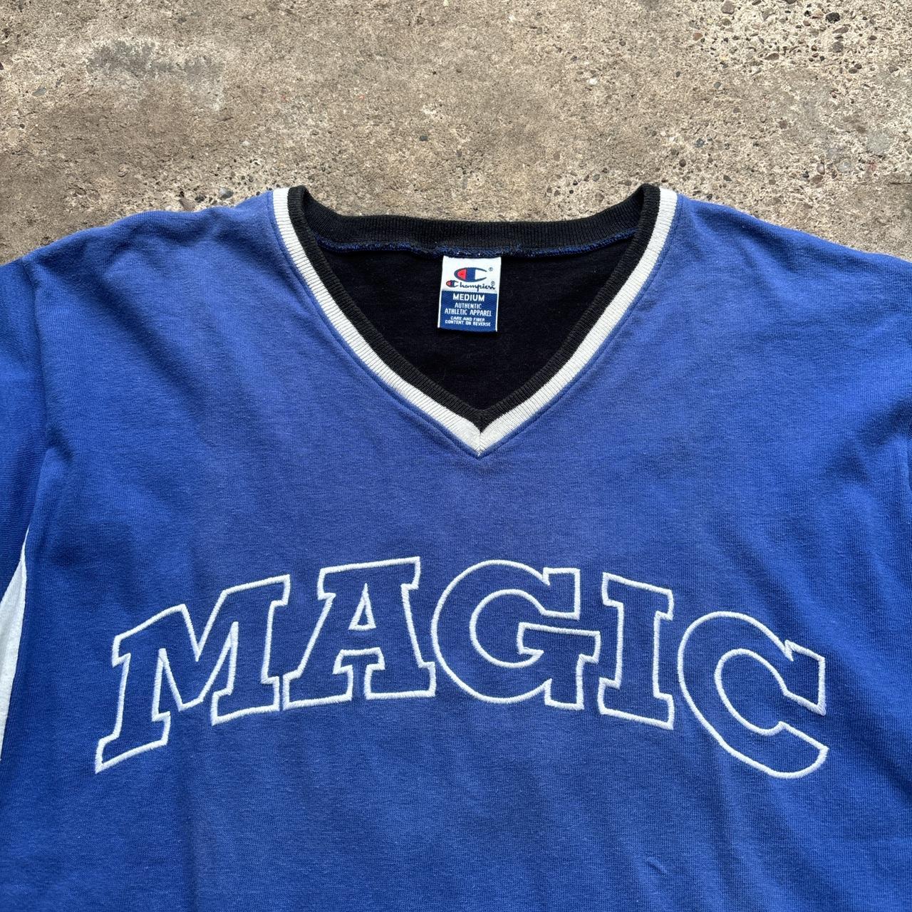 Vintage Orlando Magic 1995-97 Champion Shooting Shirt Jersey in blue, white and