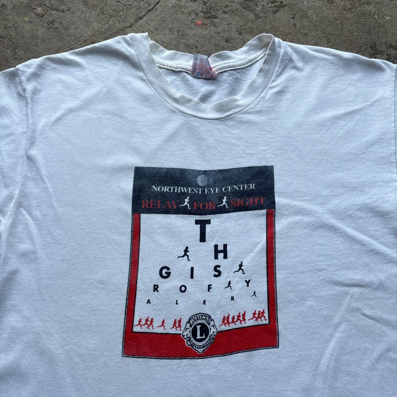 Vintage white graphic tee with Lions print - L