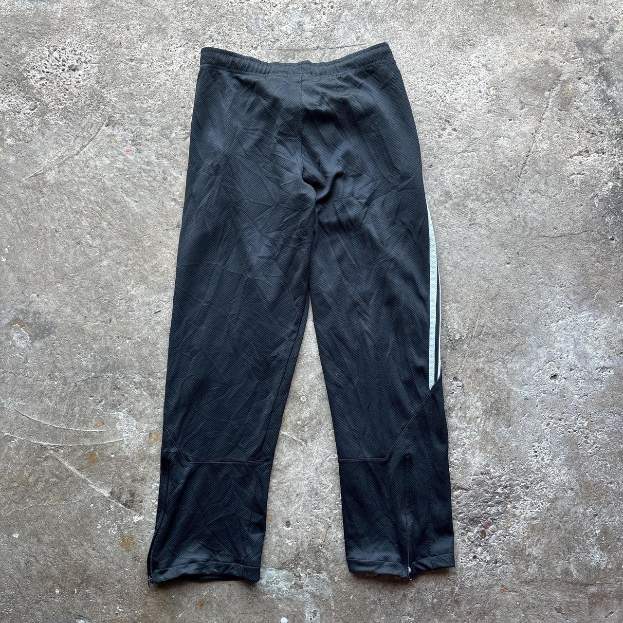 Black and white 00s Nike track pants