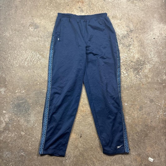 Vintage Blue Reebok track pants with embroidered logo and side stripe