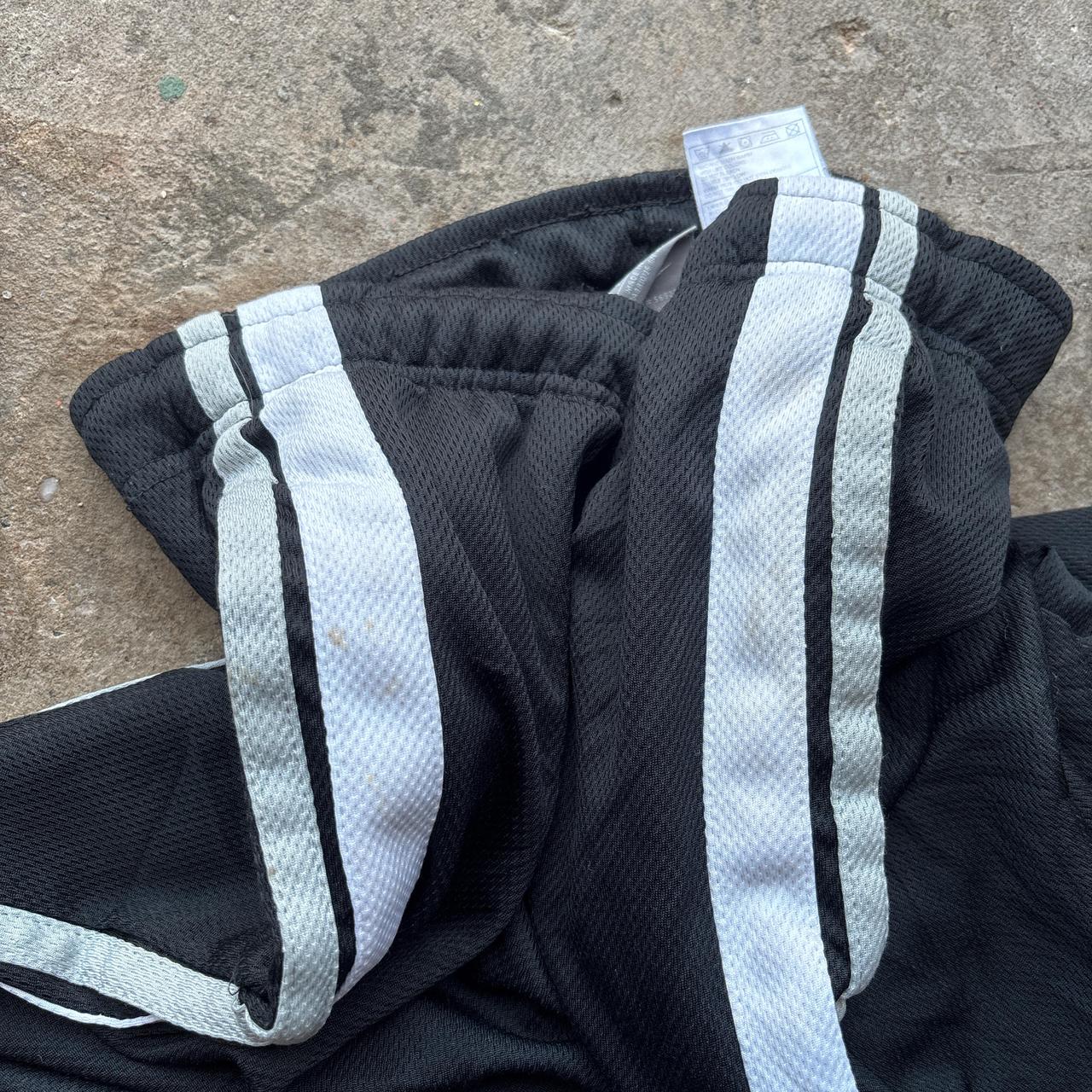 Black and white 00s Nike track pants