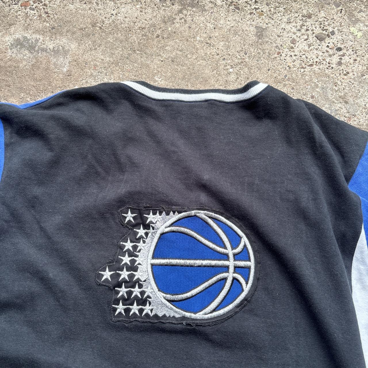 Vintage Orlando Magic 1995-97 Champion Shooting Shirt Jersey in blue, white and