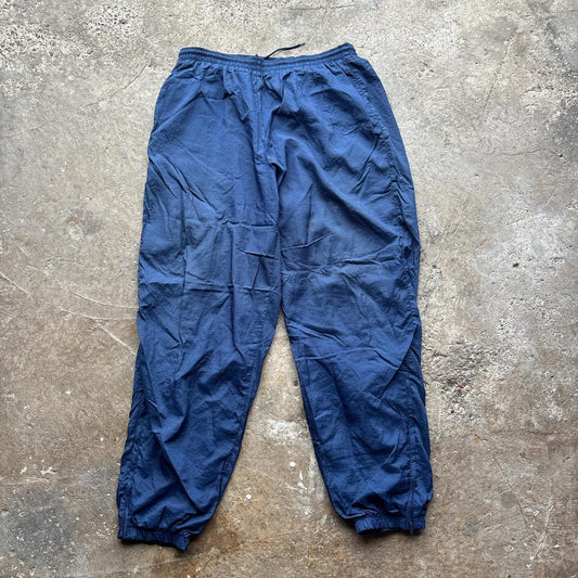 Navy Nike track pants with embroidered logo